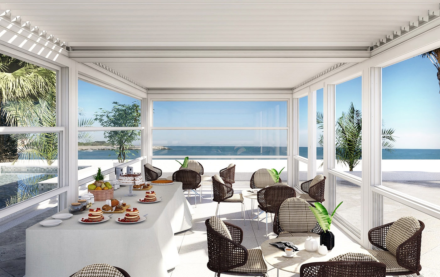 Pergola Sundream chiusa da vetrate, con salotto e colazione vista mare
