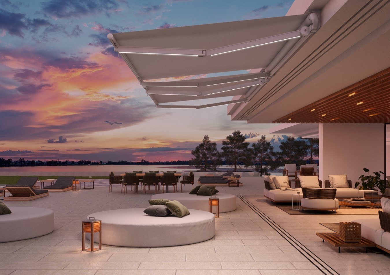 Tende Helix BQ con luci LED su una grande terrazza con salotto, al tramonto